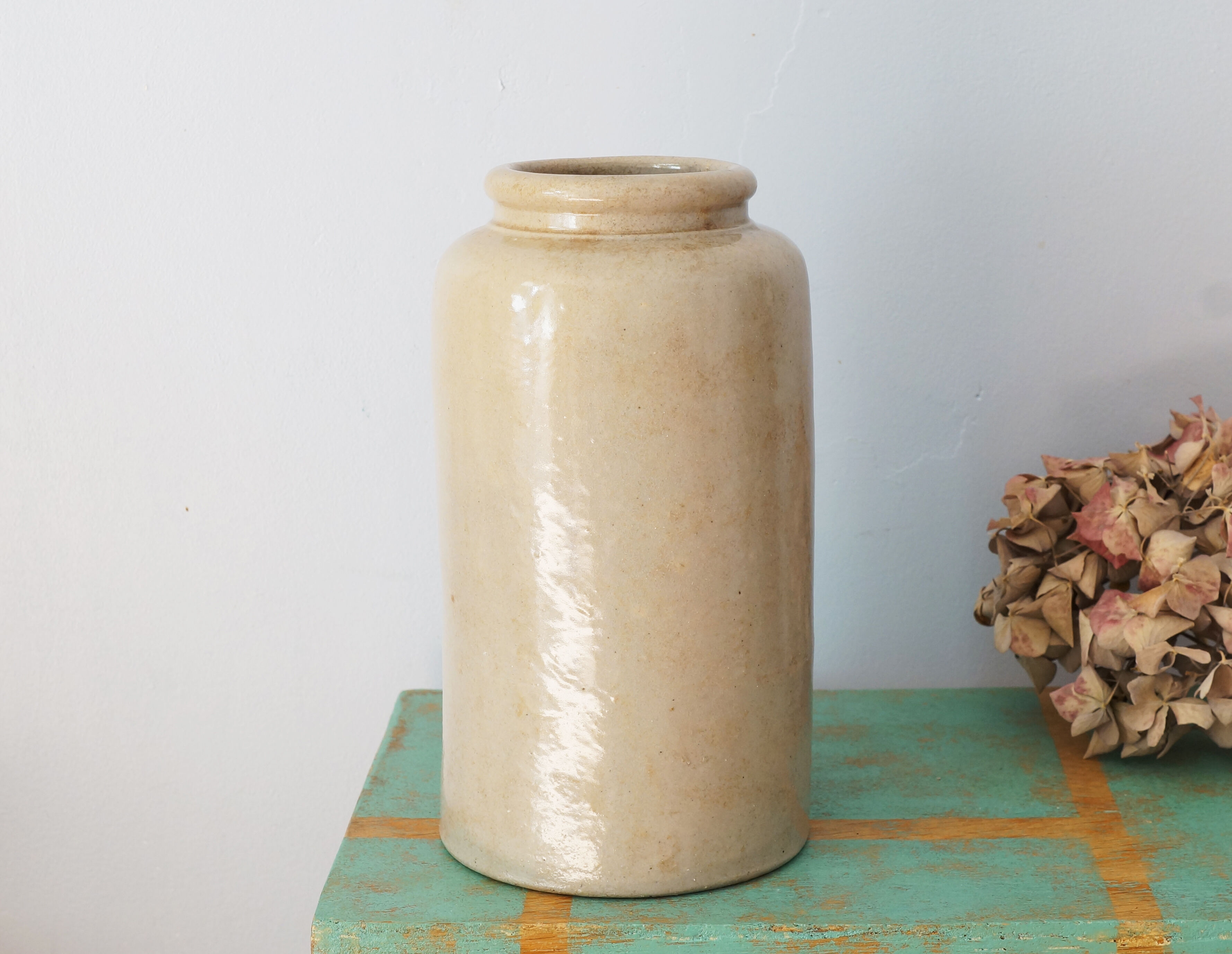 Old beige sandstone pot