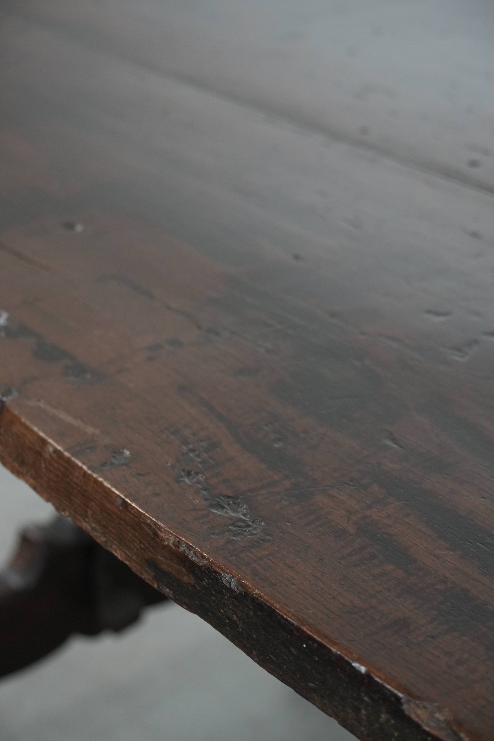 Antique Spanish table from the early 18th century with  a cast iron base