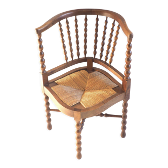 Turned wooden corner armchair