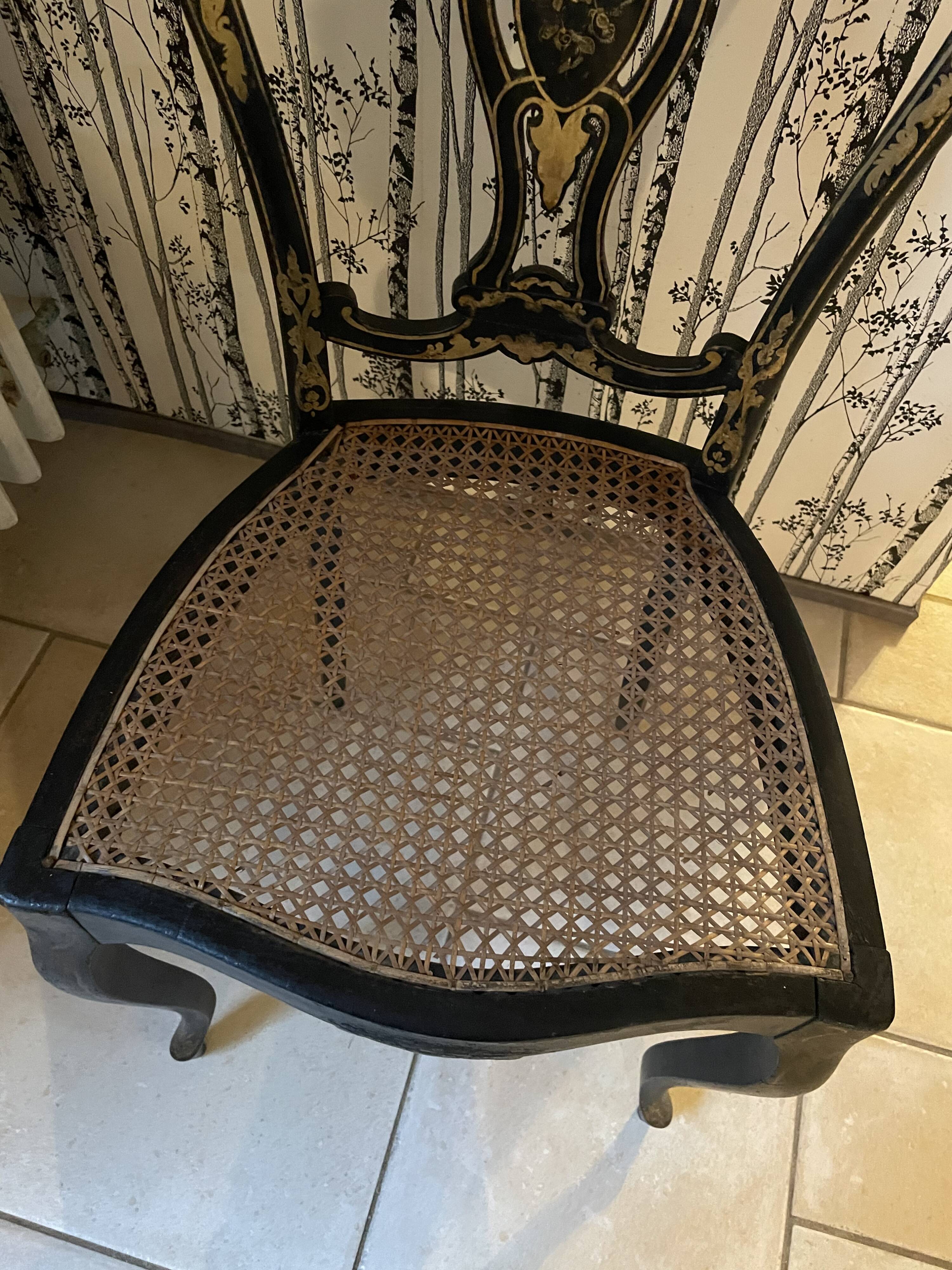 Blackened wooden chair