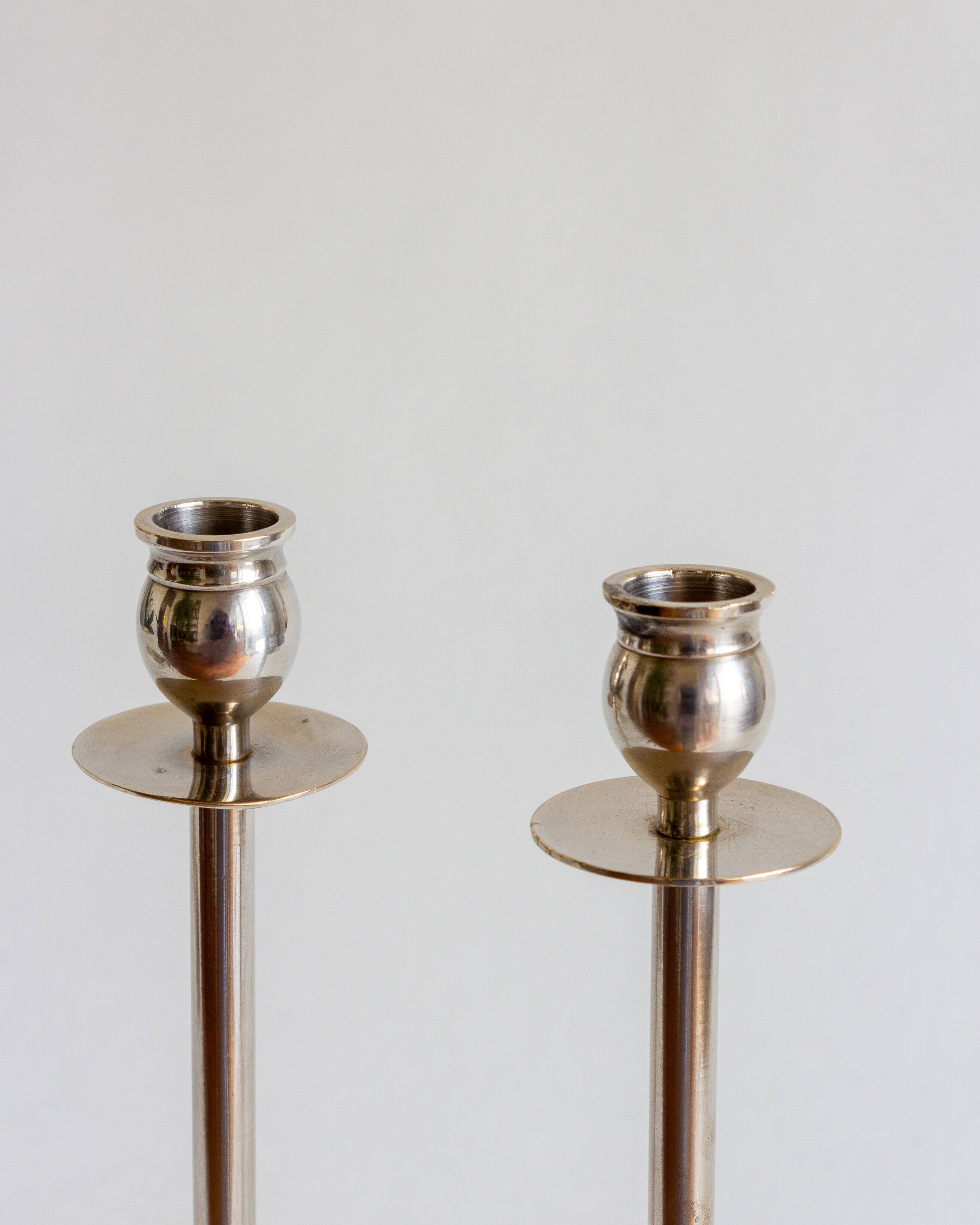 Duo of silver-plated brass candlesticks, 1950s/1960s