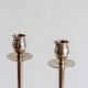 Duo of silver-plated brass candlesticks, 1950s/1960s