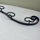 Wrought iron coat rack