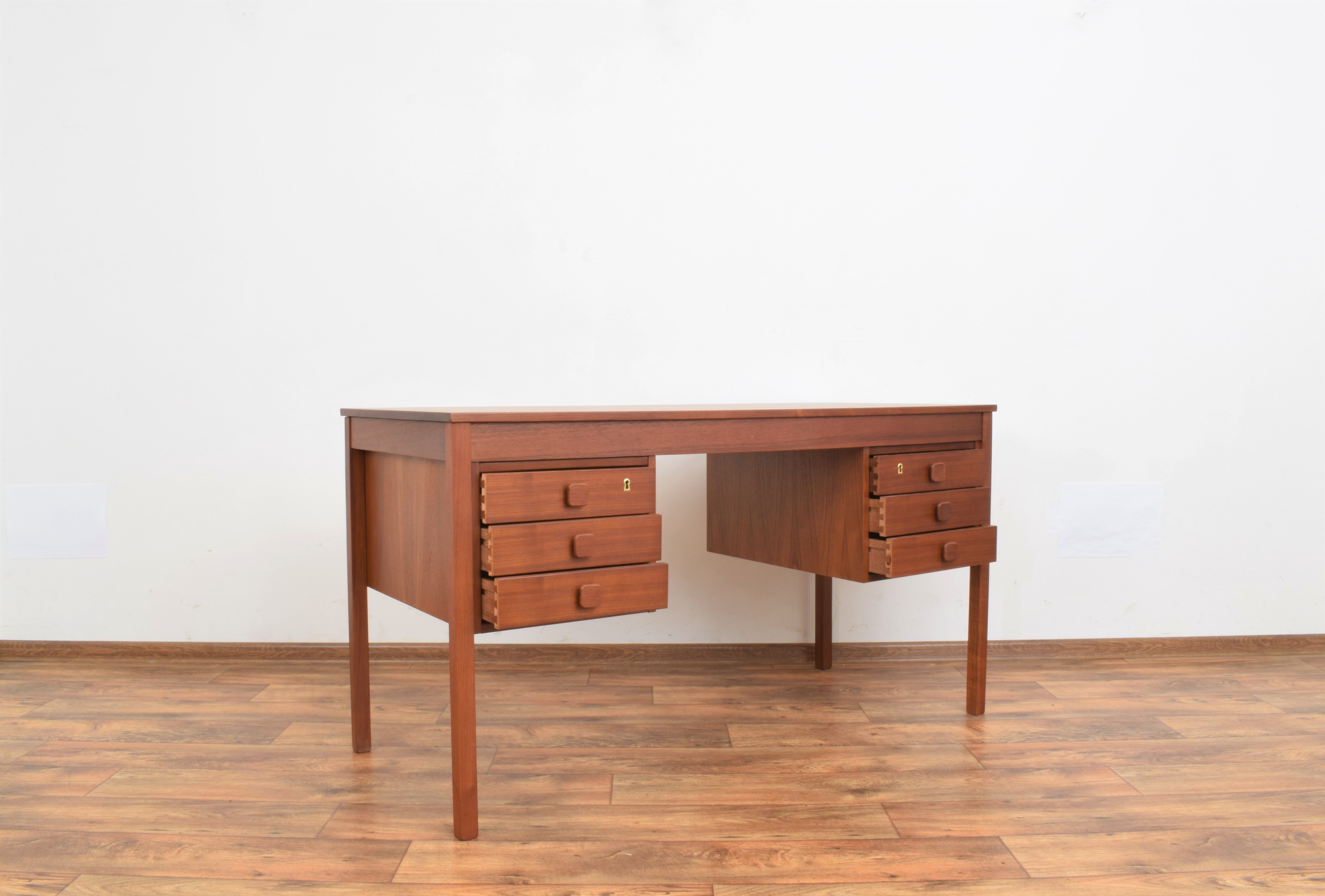 Teak desk and walnut armchair