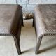 Pair of large riveted metal industrial tables