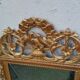 Antique gilded wooden mirror in Louis XVI style