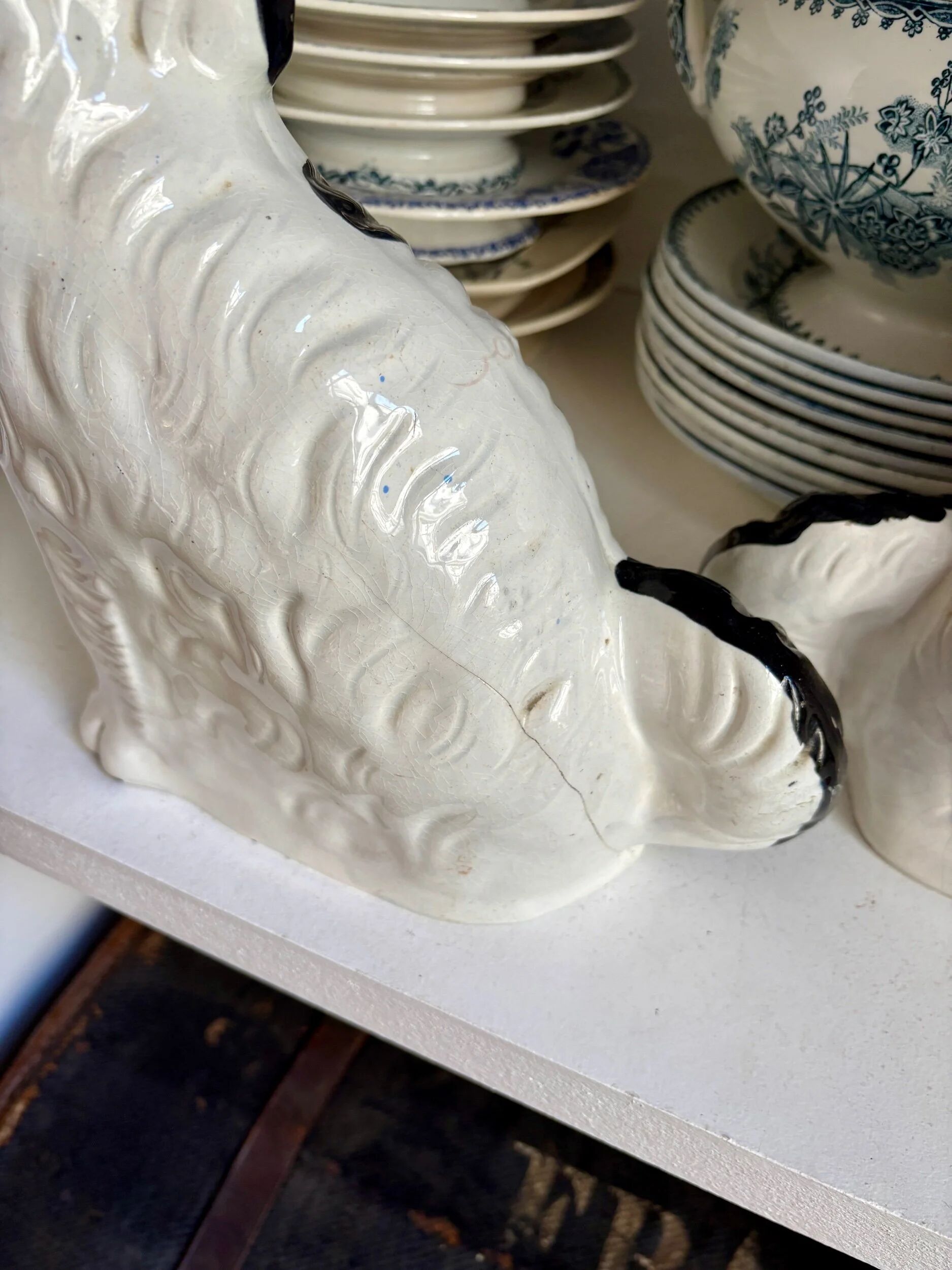 Pair of black Cavalier King Charles dogs in Staffordshire pottery, 19th century.