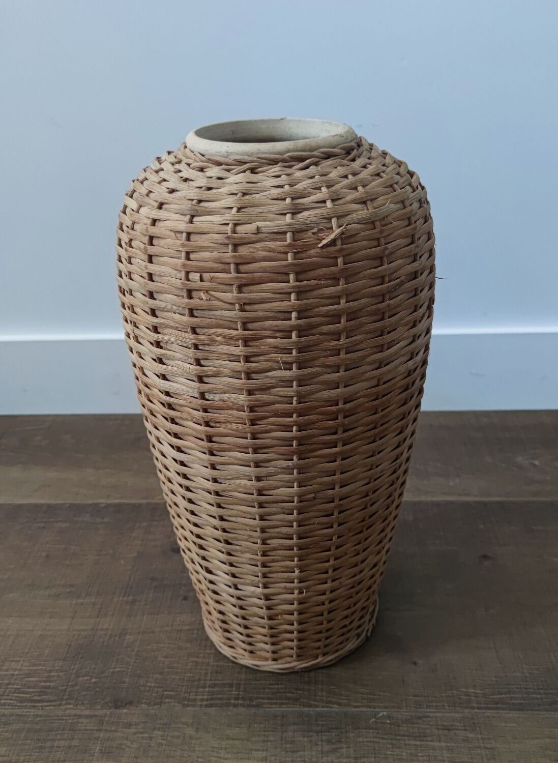 Sandstone/wicker vase