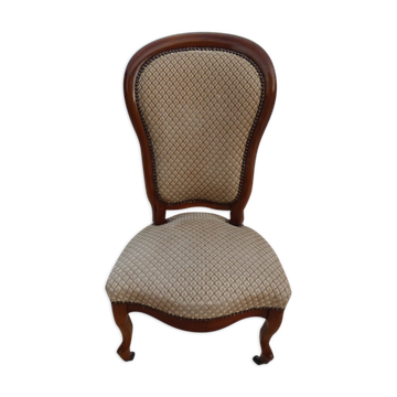 Antique chair with roulette wheel