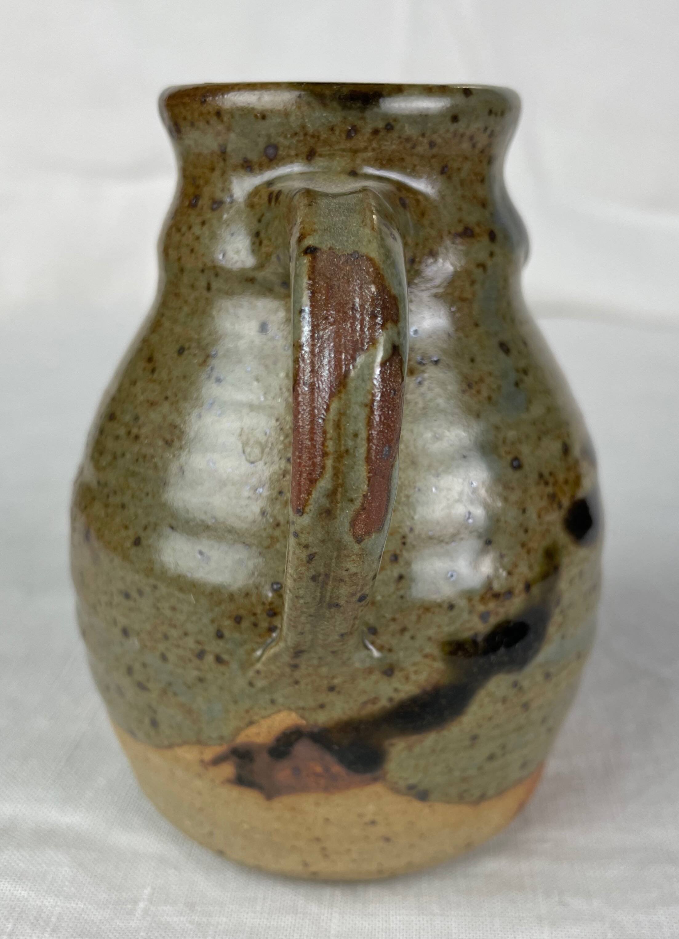 Milk jug in Matour pottery style