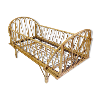 Evolving rattan bed for children from the 60s-70s.