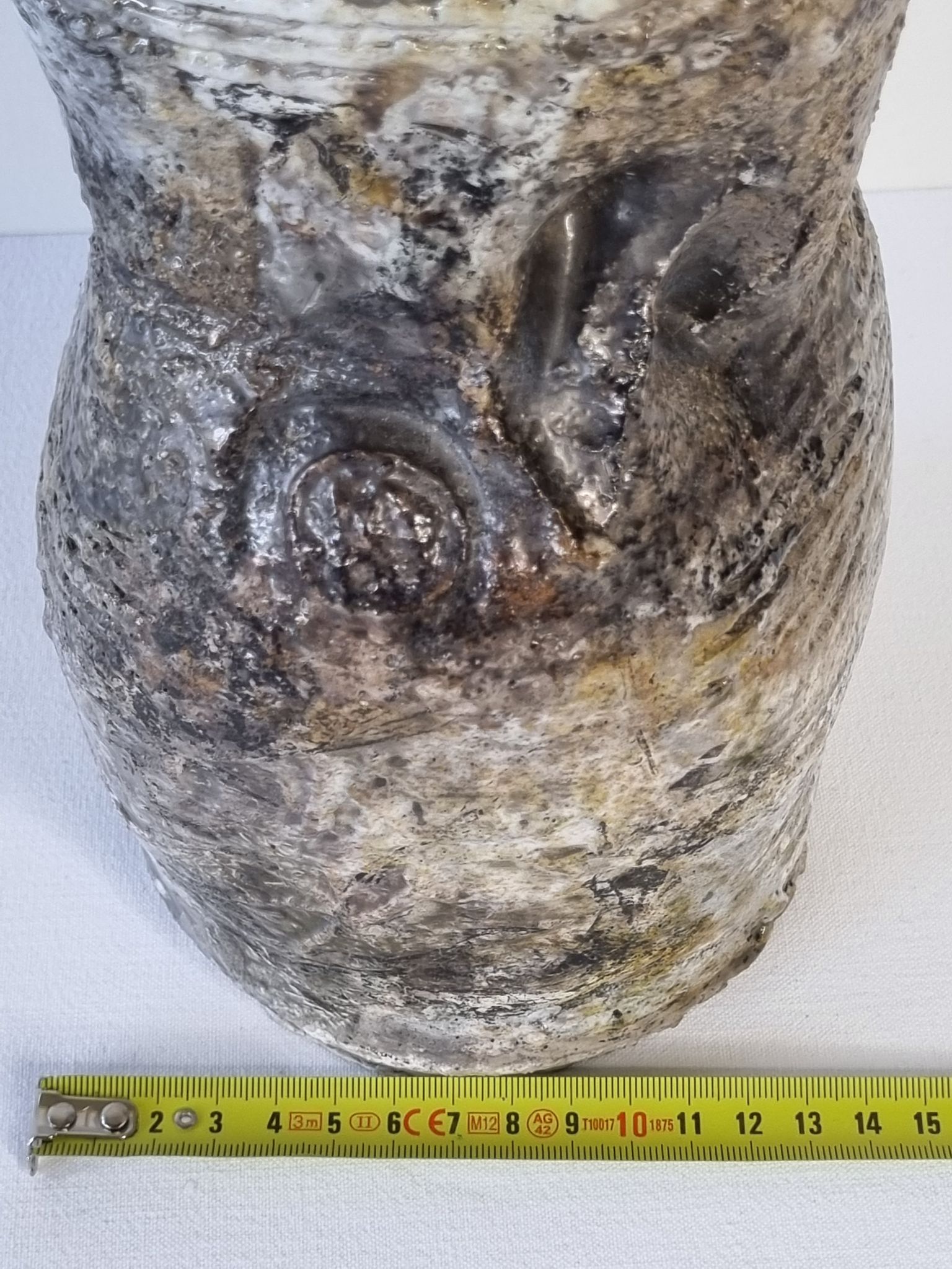 Enamelled ceramic roll vase