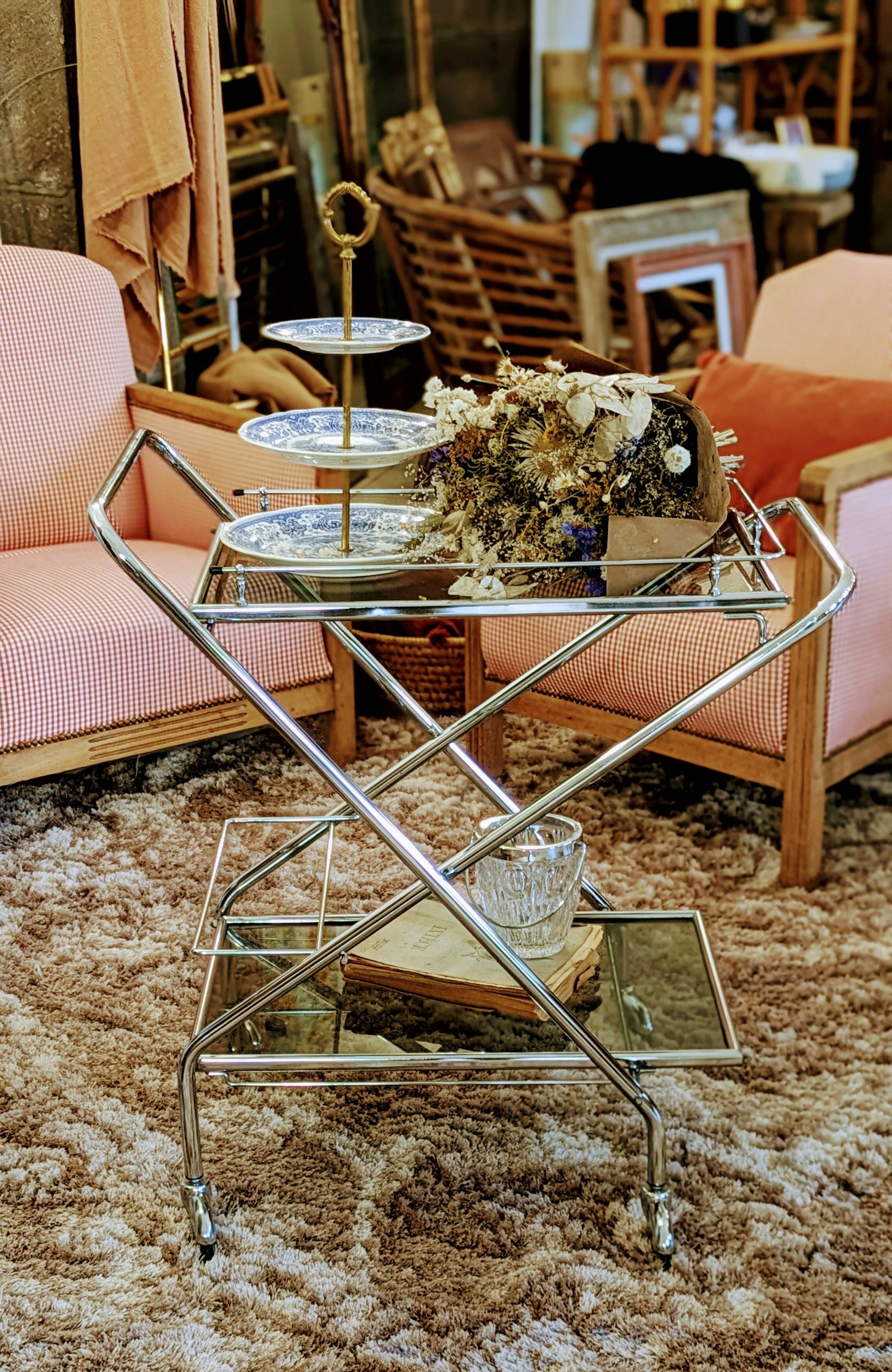 Foldable stainless steel serving trolley with smoked glass tops