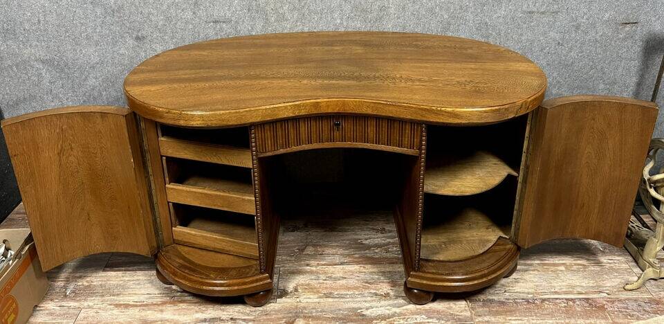 Art Nouveau period bean-shaped oak and walnut center desk