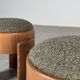 Sculptural pair of ash wood stools with dedar milano bouclé