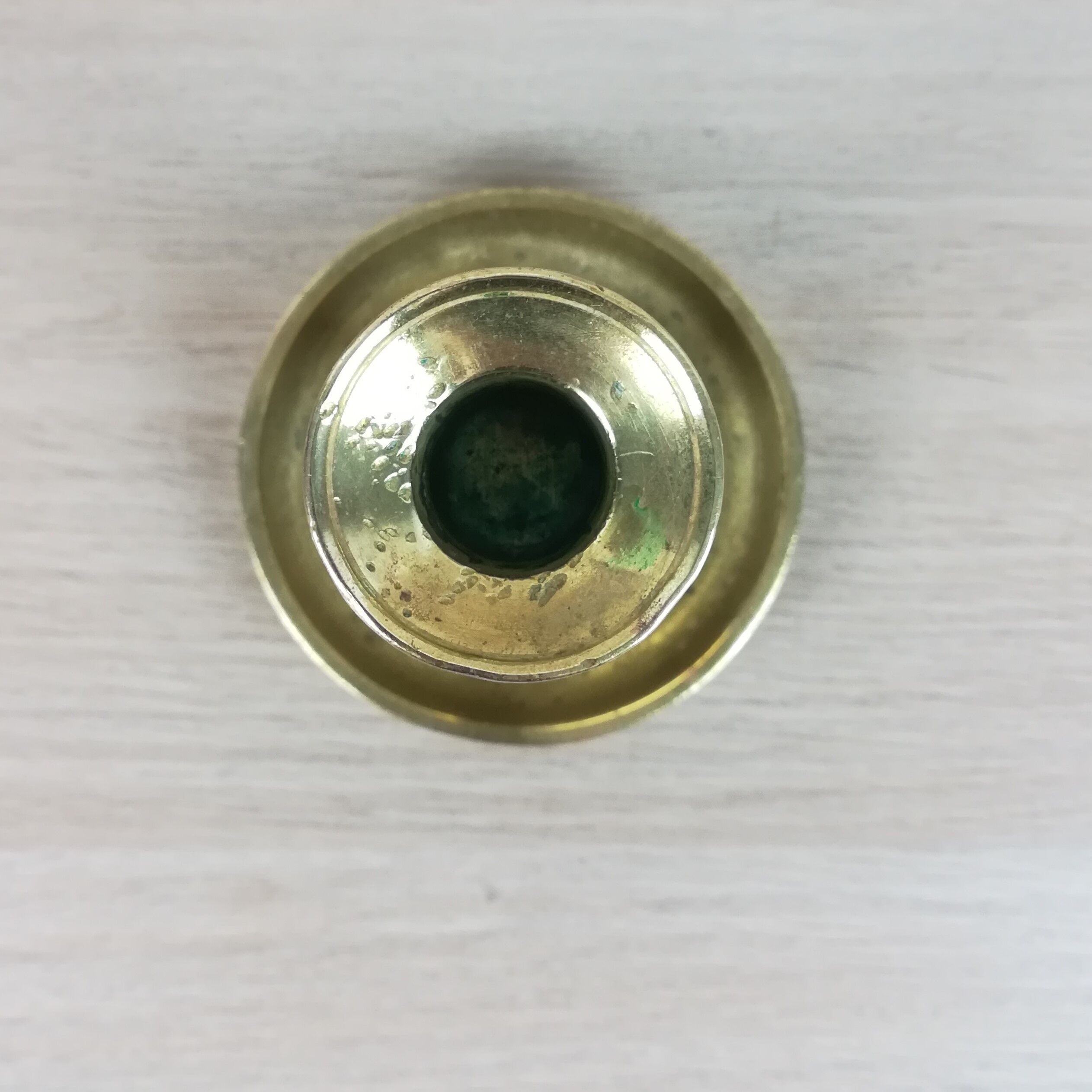 Brass pusher candle holder