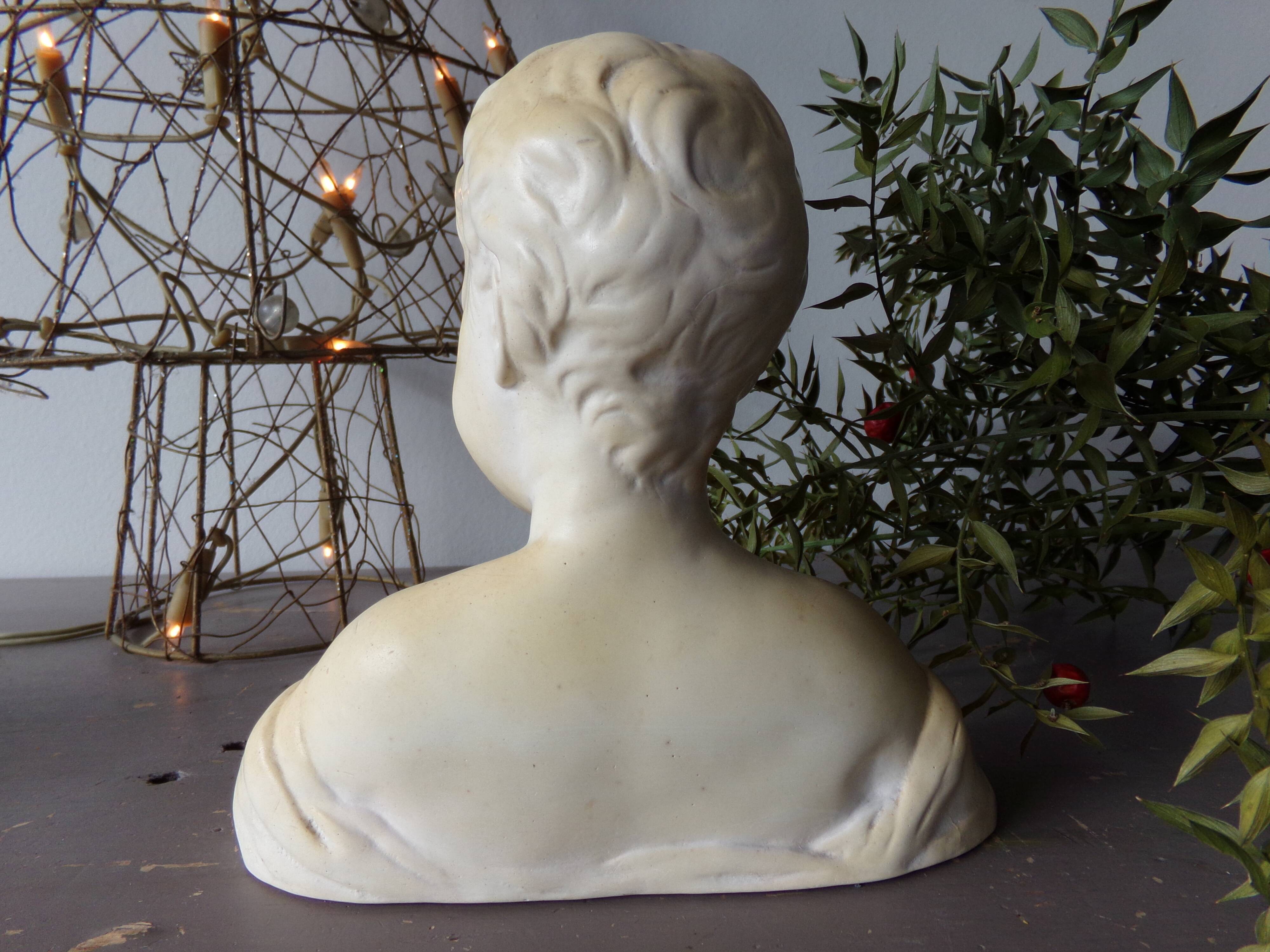 Bust of the laughing child