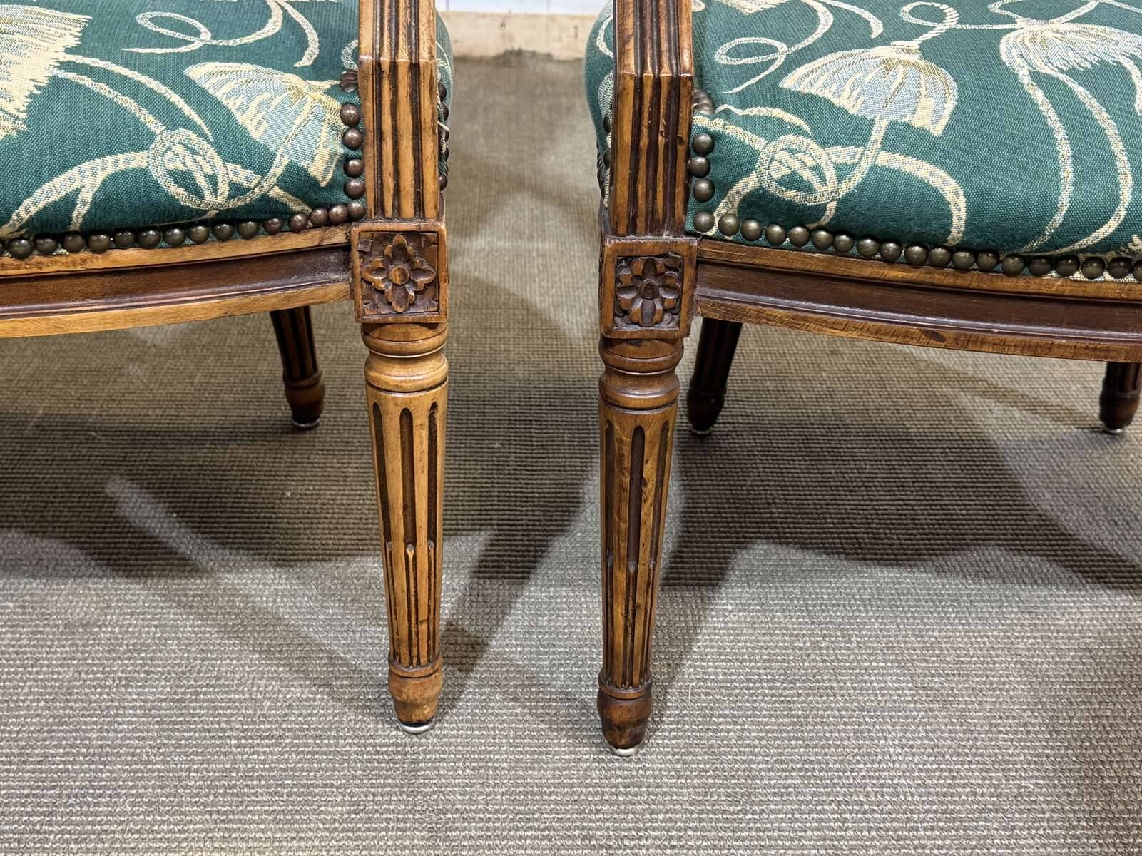 Pair of Louis XVI style armchairs in beech from the 19th century.