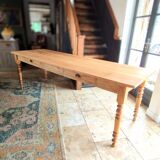 Table de drapier en chêne massif doré 230x73cm deux tiroirs