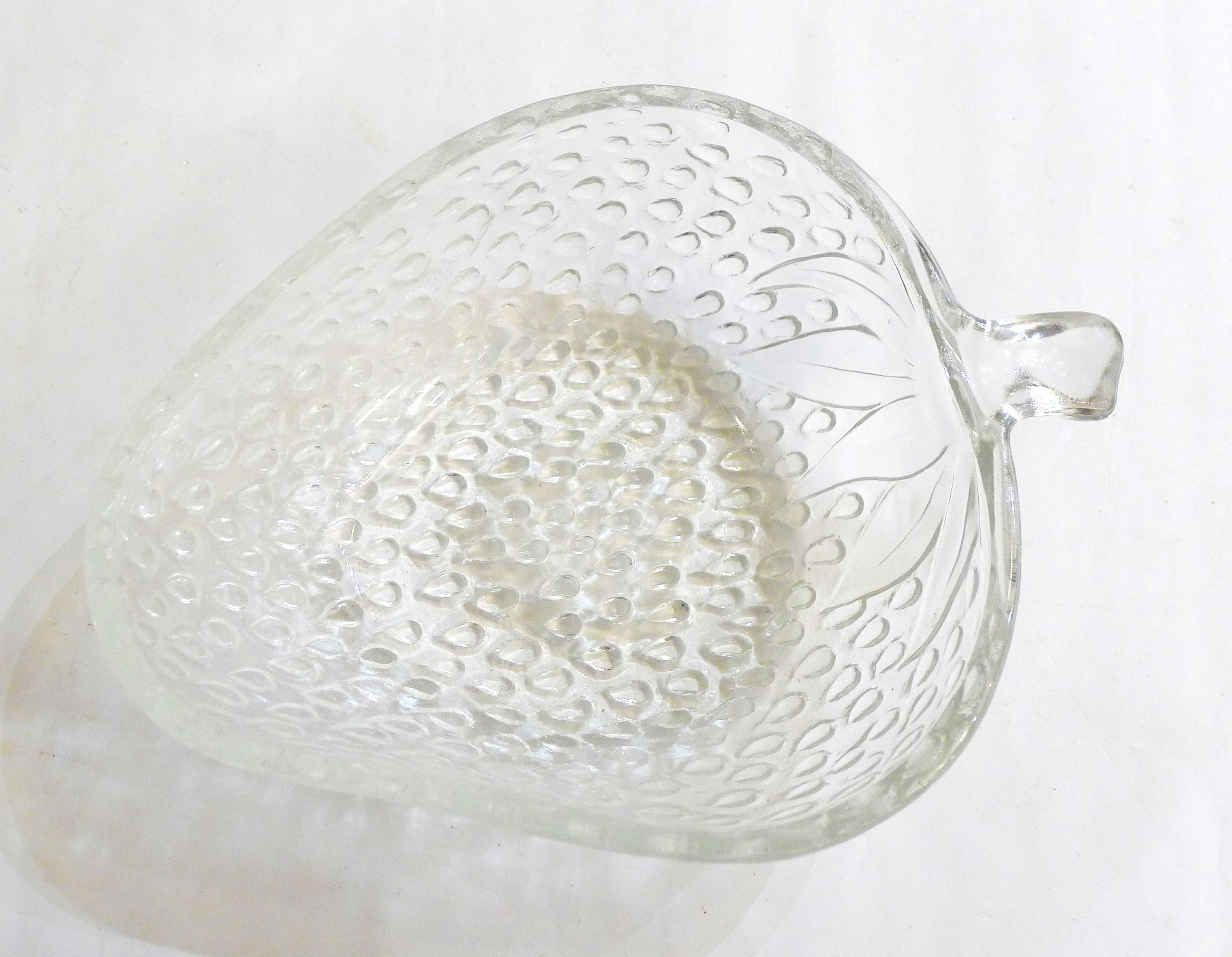 Strawberry salad in colorless glass