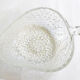Strawberry salad in colorless glass
