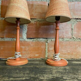 Pair of antique turned wood bedside lamps with push button switch