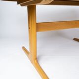 Dining table in oak of danish design manufactured by Skovby Furniture Factory from the 1960s.