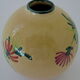 Vase "ball" decorated floral in polychrome earthenware glazed by Saint-Clement