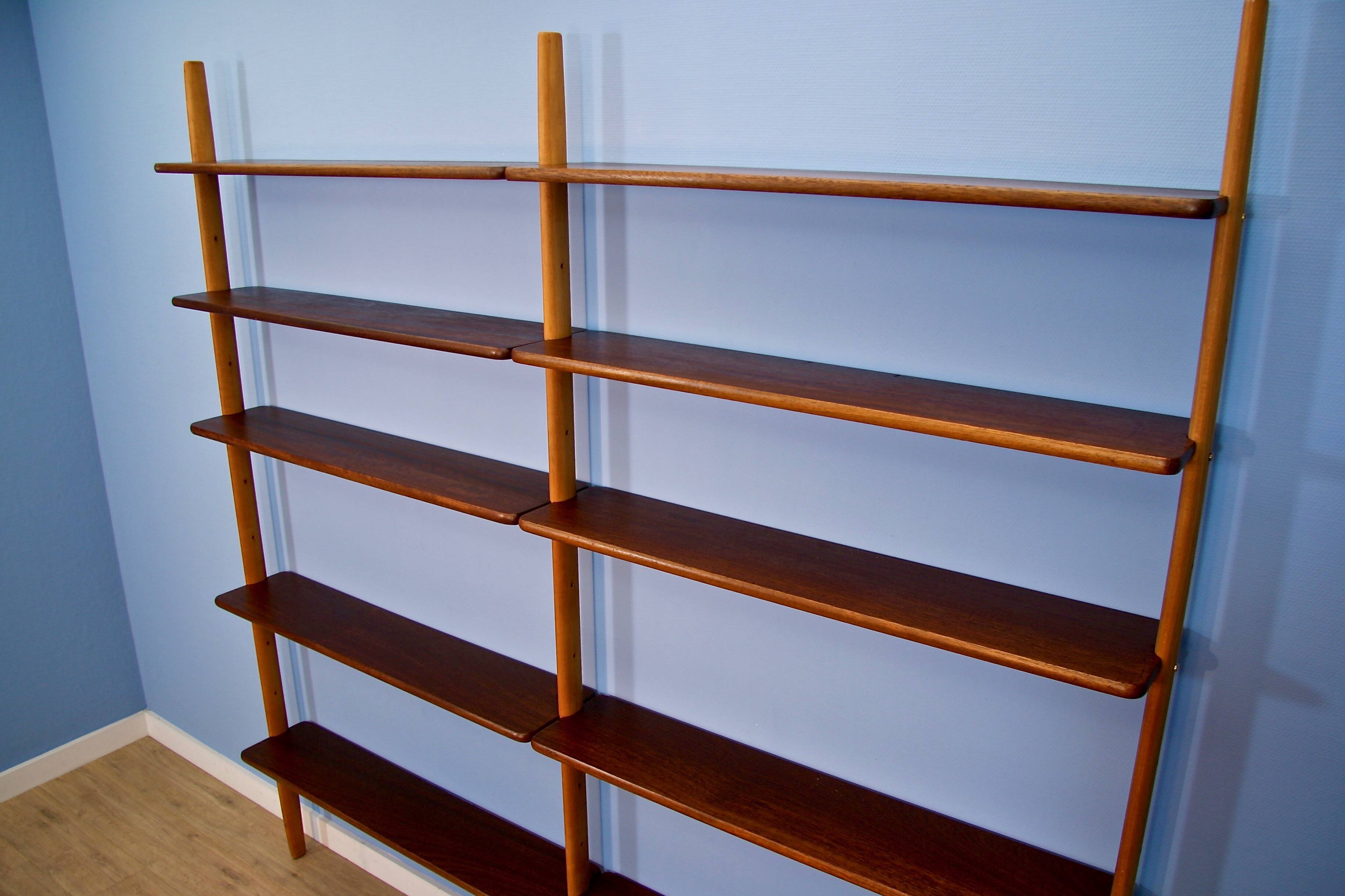 A Danish wall unit in teak and beech by William Watting for Scanflex, 1950s.