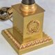 Lampe en bronze doré et patiné de style empire abat jour plissé