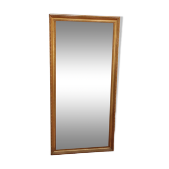 Old beveled mirror with gilded wood frame 20th century