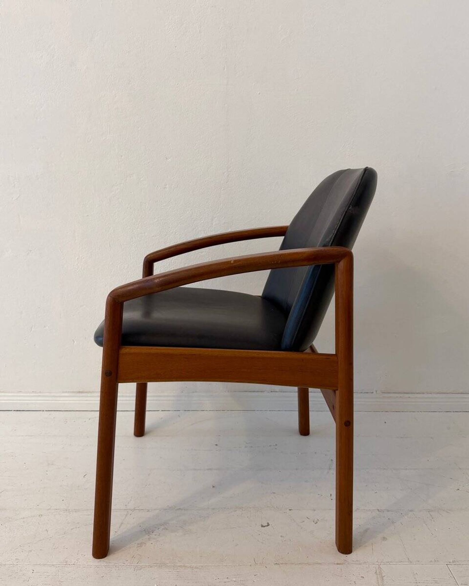 Mid-century modern chair in teak and black leather, Germany, 1960s