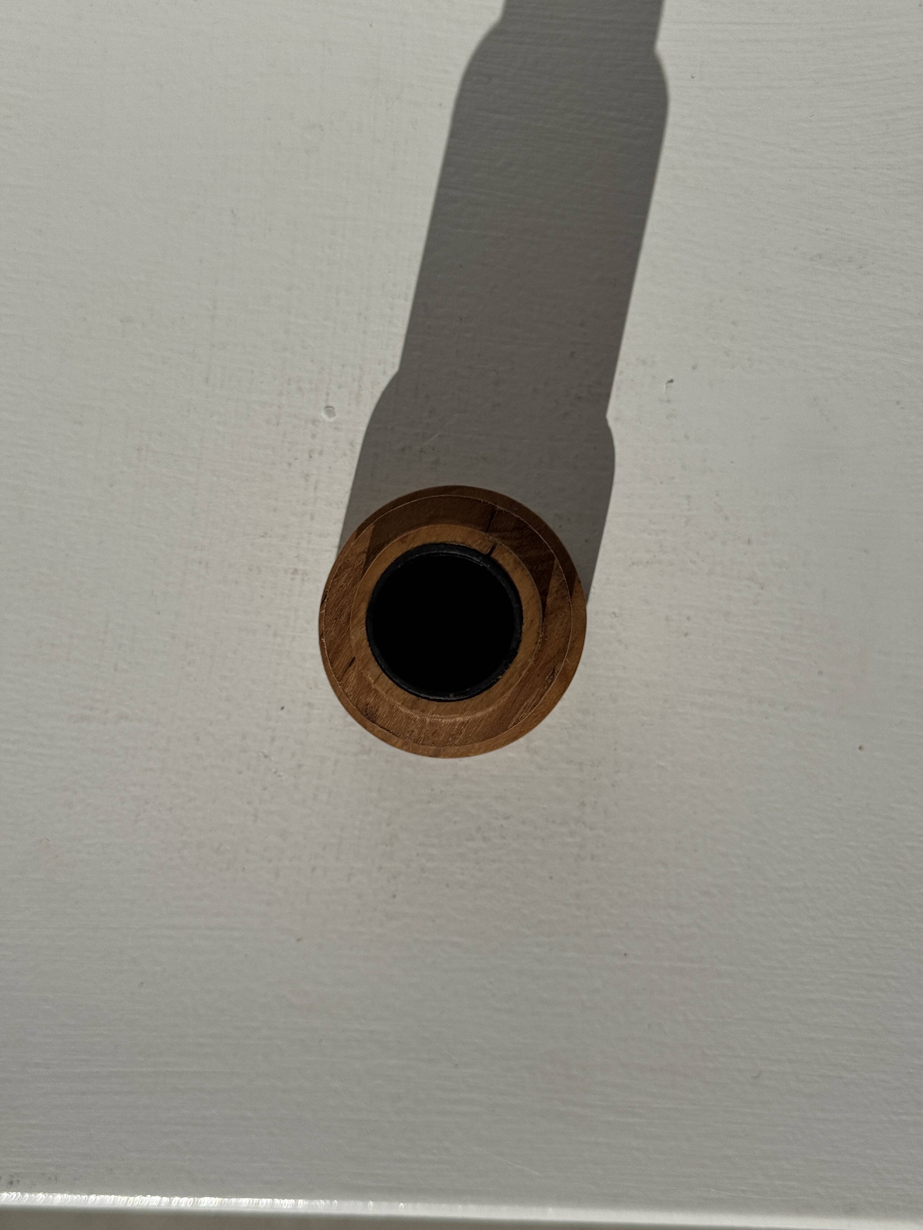 Circular teak monoxyle candlestick, pyramidal with a high central part H7 D5.