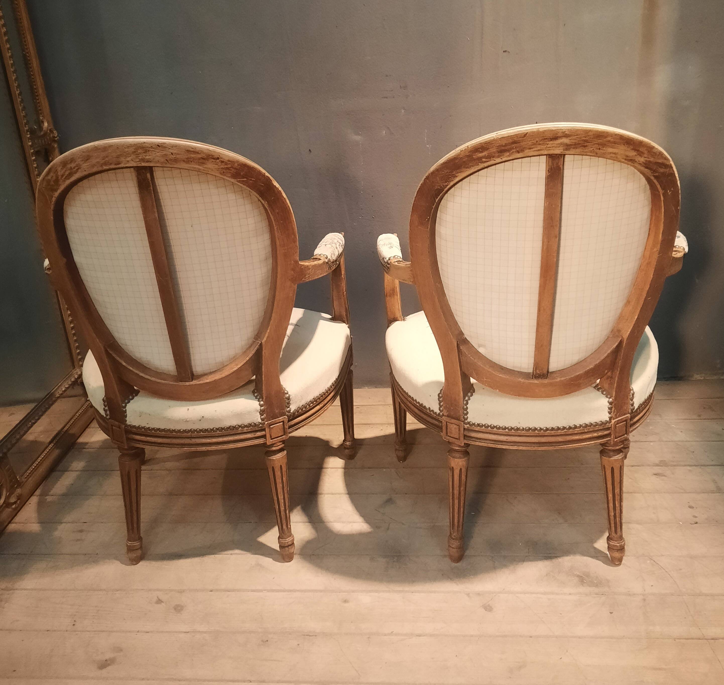 Pair of Louis XV style medallion armchairs.