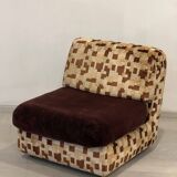 Vintage armchair from the 70s in beige and brown.