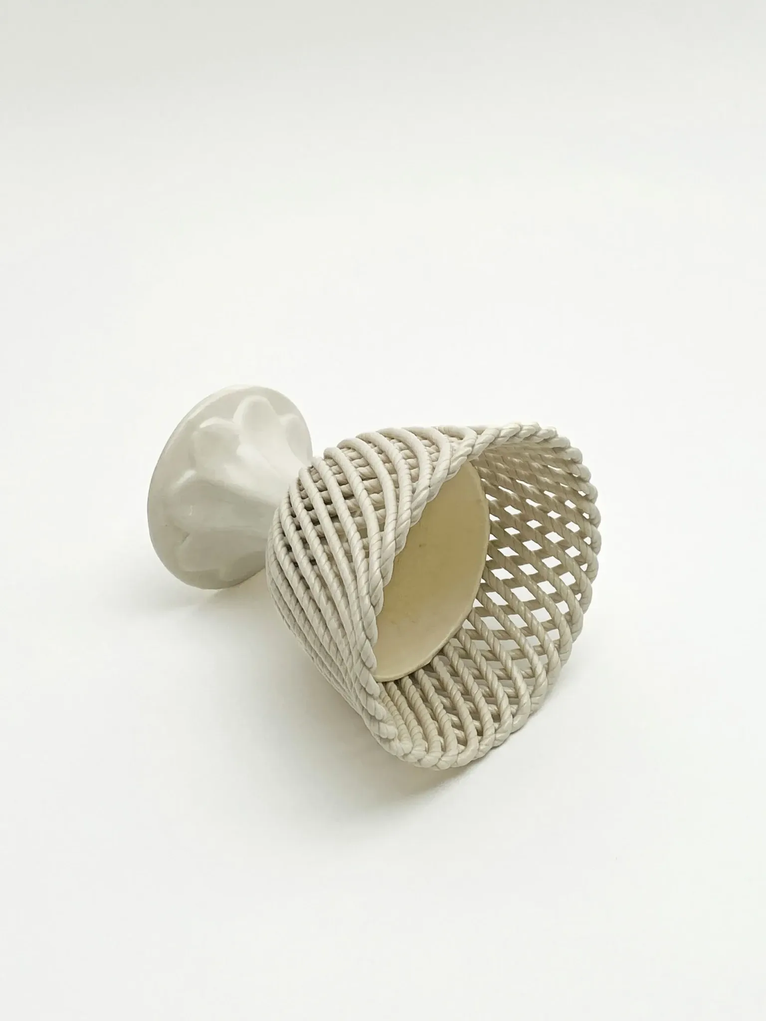 Openwork cup on pedestal