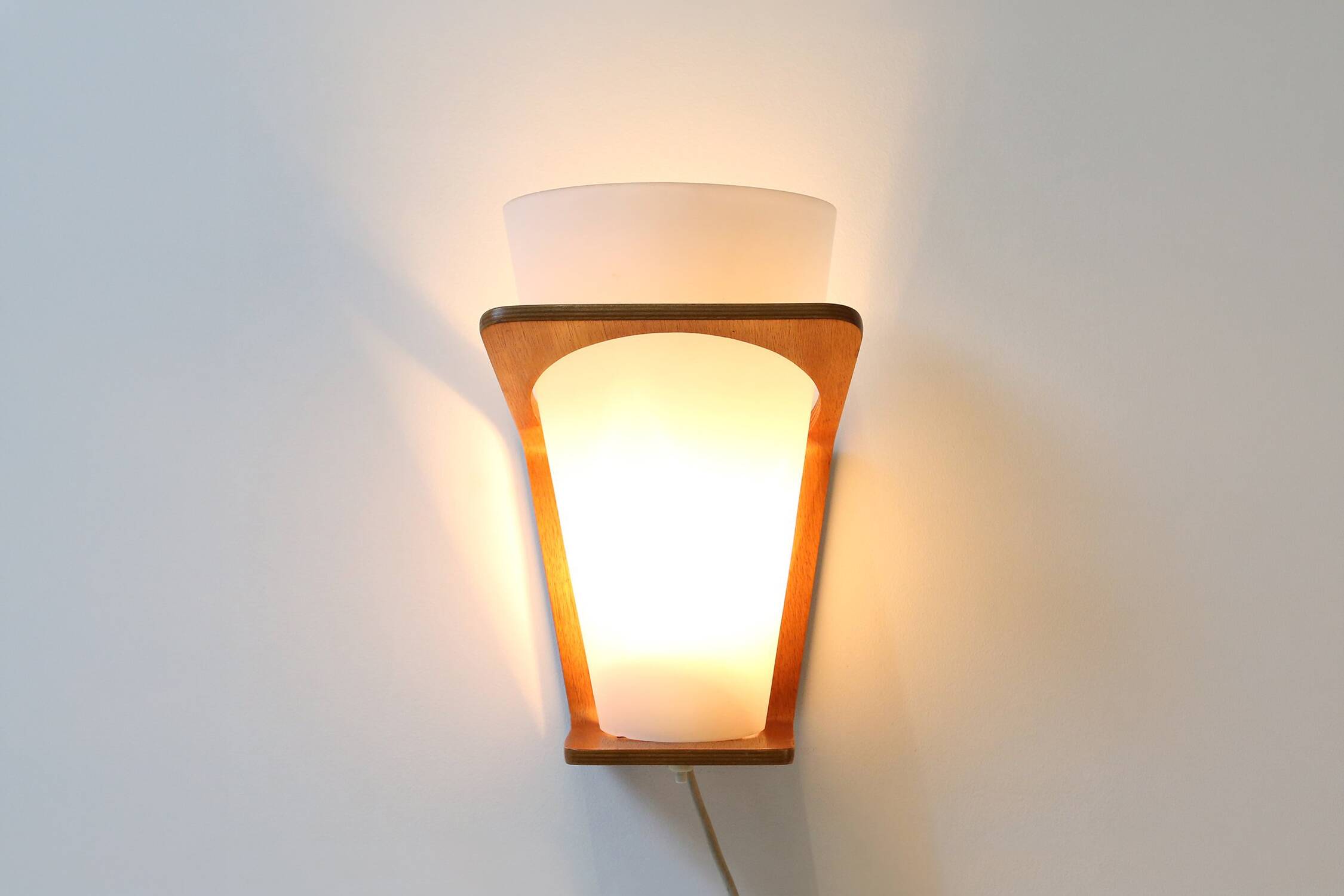 Wall Lamp in Curved Teak Plywood by Louis Kalff for Philips, 1959