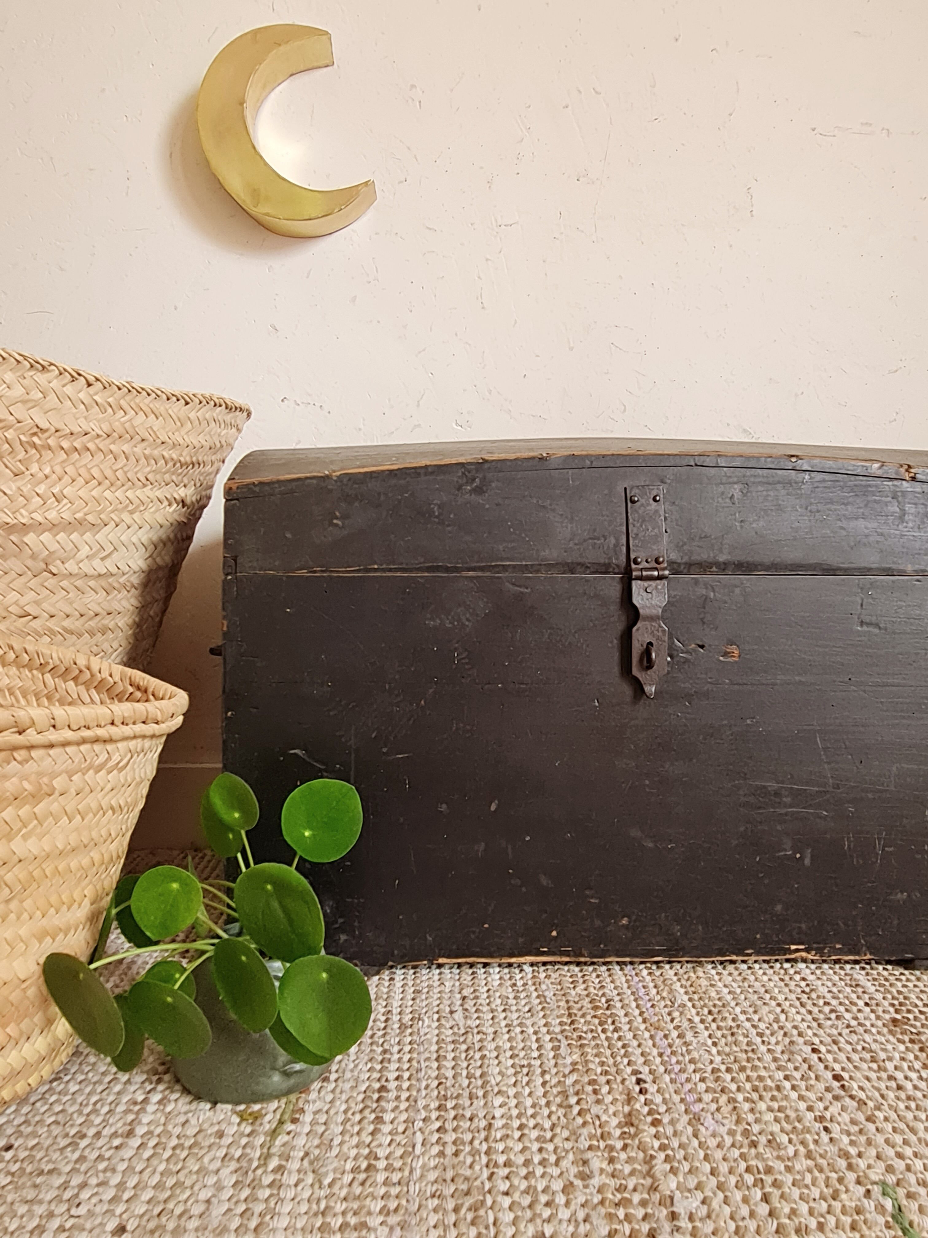 Old chest in black wood