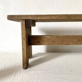 Low stool in raw wood