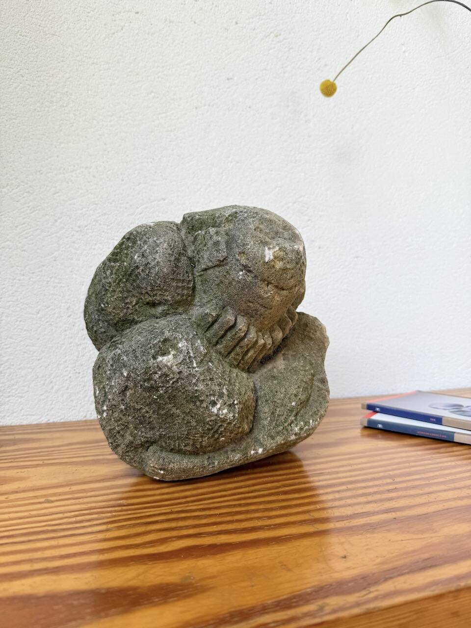 Stone sculpture of a man