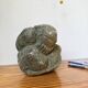Stone sculpture of a man