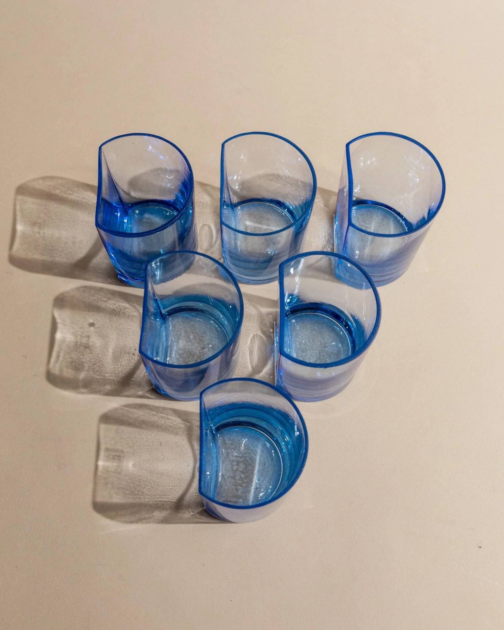 Set of 6 vintage blue drinking glasses with curved design, Pitti Studio, Italy, 1980s.