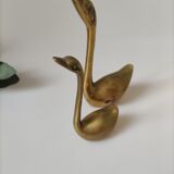 Golden brass swan duo