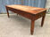 Antique farmhouse table from the reconstruction period in solid cherry wood