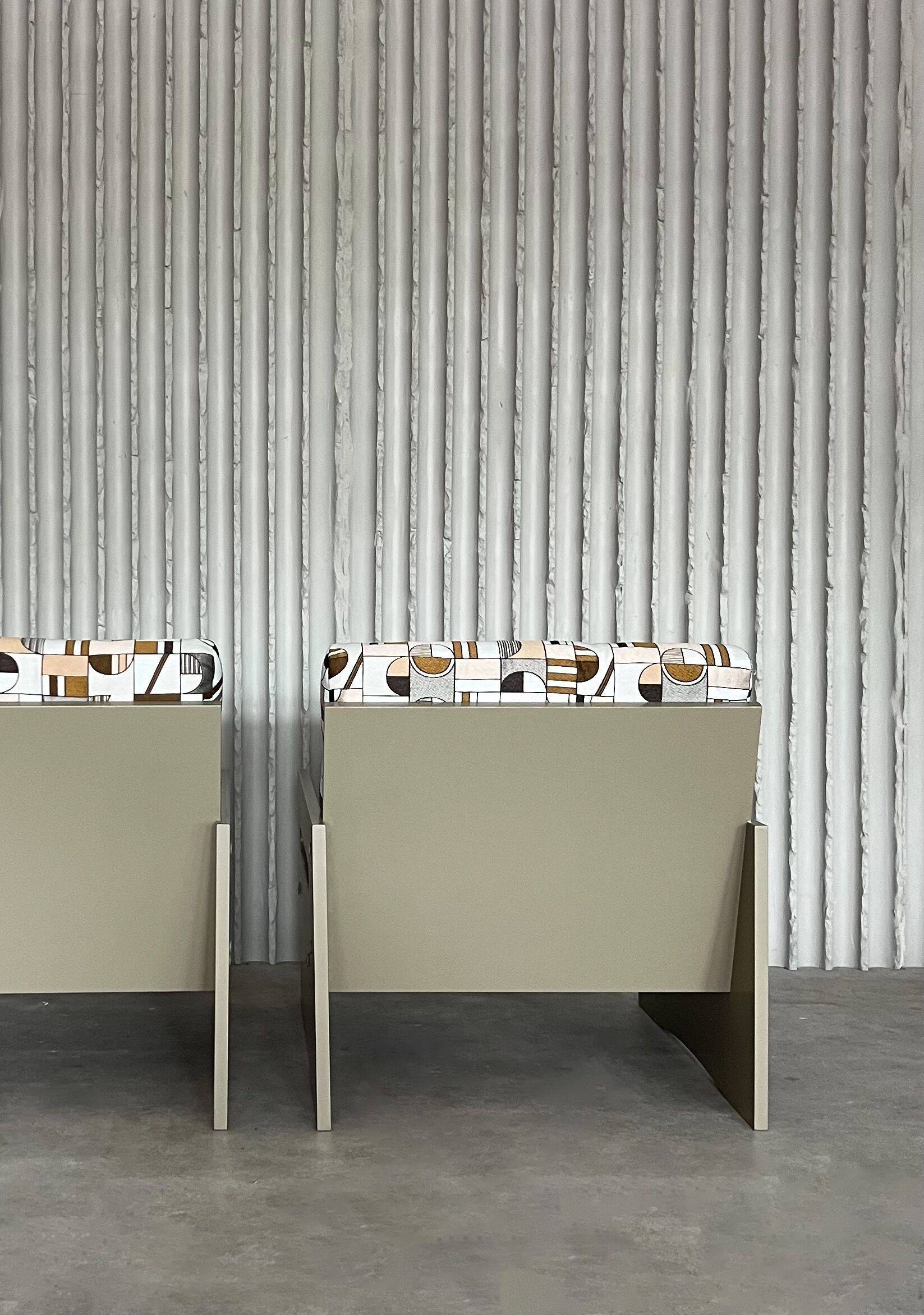 Vintage lounge chairs – newly upholstered in geometric fabric