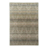 Oriental rug in green and beige wool.