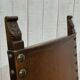 High-backed chair from the early 20th century in oak and leather