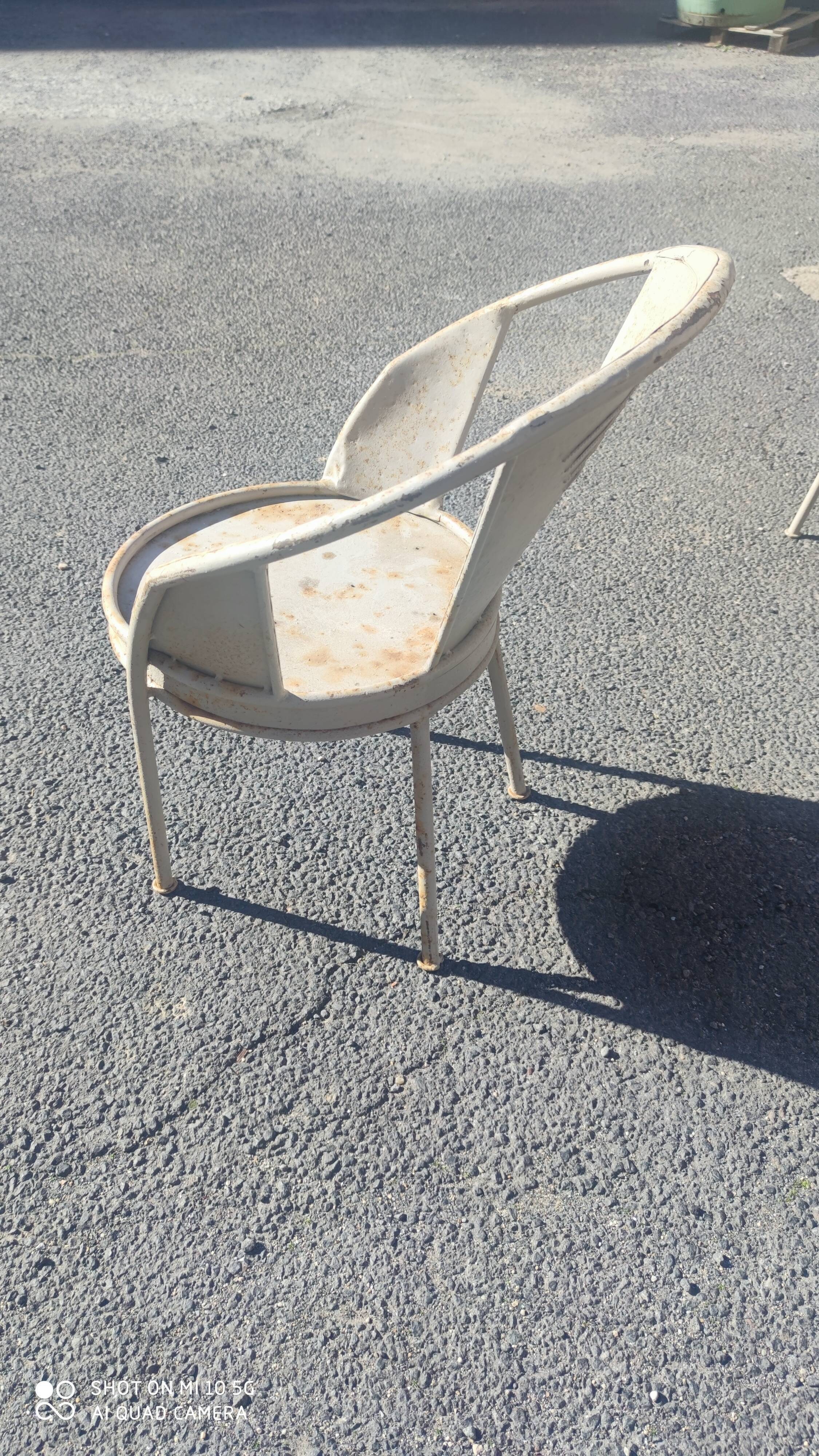 Series of 10 garden chairs made of steel garden patina