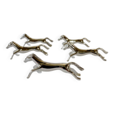 5 porte-couteaux en métal argenté en forme de cheval. Années 1960