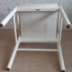 White Baumann chair.